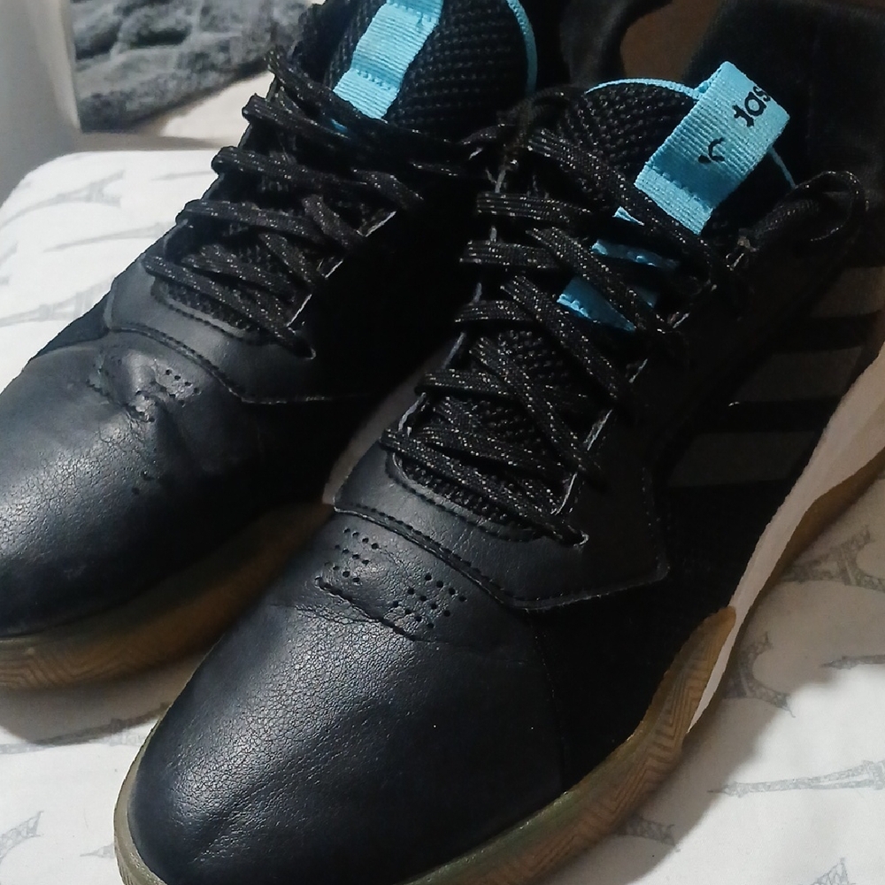 These are Adidas RunTheGame basketball shoes in the Core Black/Grey Six